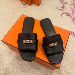 Hermes Black Leather Slippers with Gold Buckle